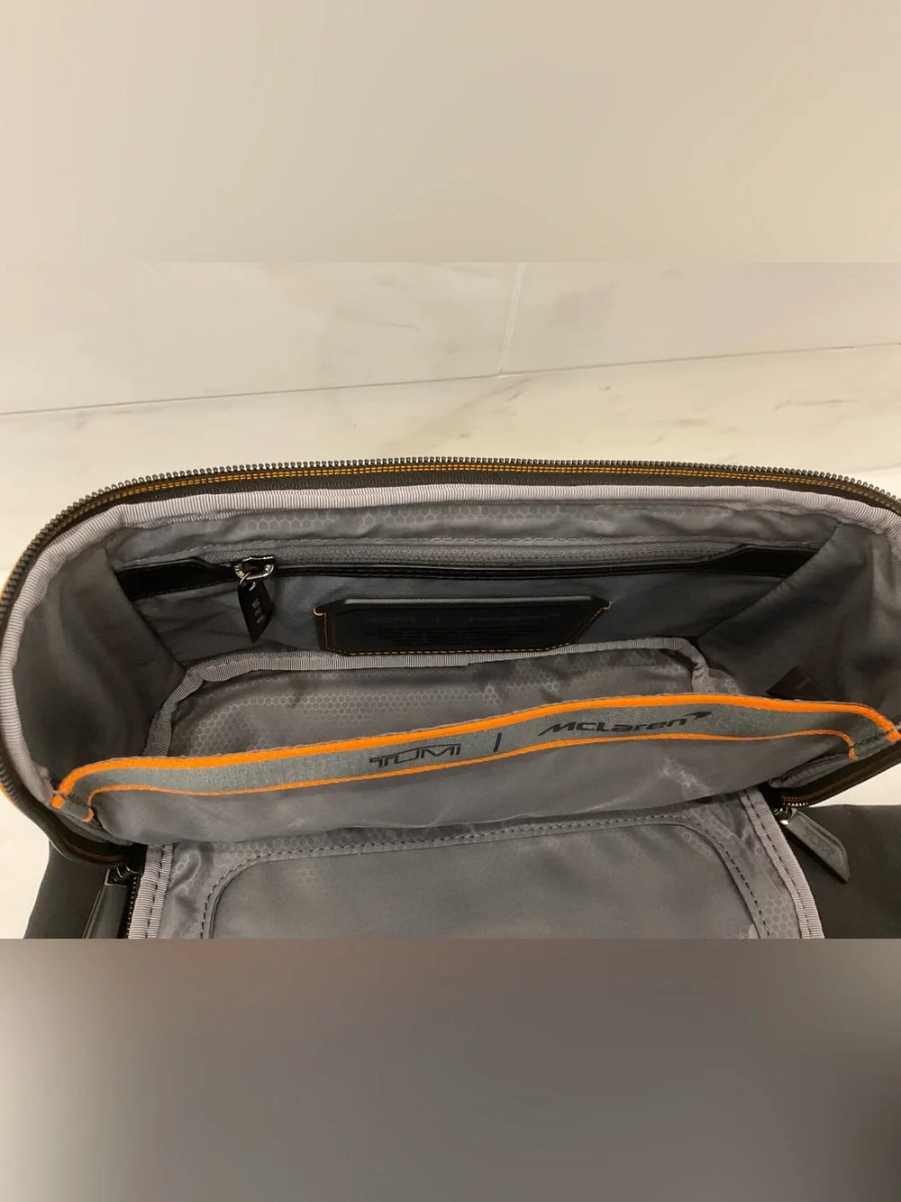 NWOT Tumi McLaren REMEX 10.0” x 5.25” Accessory Kit Bag - BLACK & PAPAYA ORANGE